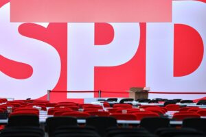 SPD-Logo mit einem Symbol für Protest gegen das Bürgergeld und politische Auseinandersetzungen.
