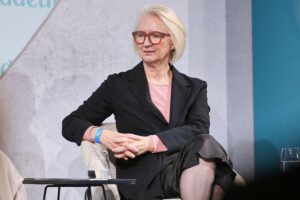 Monika Schnitzer diskutiert gerechte Besteuerung von Firmenerben in München, vor Gerichtsurteil zur Erbschaftsteuer.