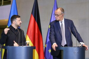 Selenskyj und Merz am Telefon, symbolisieren Unterstützung und Zusammenarbeit zwischen Deutschland und der Ukraine.