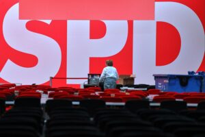 SPD-Logo mit Wahlkampfaufruf im Hintergrund, unterstützt von Ministerpräsidenten für Sachsen-Anhalt.
