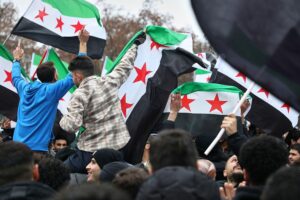 Syrische Flüchtlinge in Deutschland diskutieren Rückkehrmöglichkeiten und Erkundungsreisen in ihre Heimat.