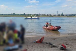 Einsatzkräfte retten Mann aus dem Rhein nach Badeunfall, Warnung vor Gefahren des Wassers.