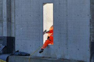 Bauarbeiter auf einer Baustelle; Thüringer Statistik veröffentlicht Faltblatt zur Bautätigkeit und Wohnungsentwicklung.
